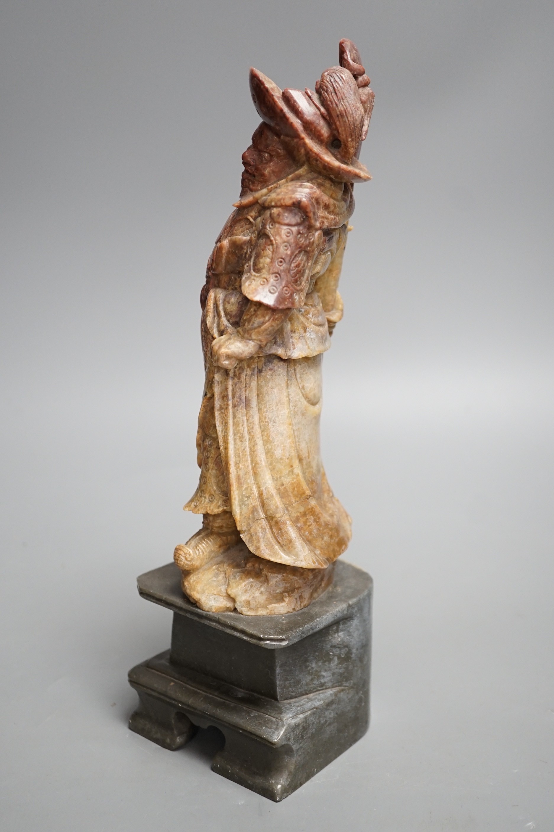 An early 20th century Chinese soapstone carving of Zhong Kui, 30cm high.